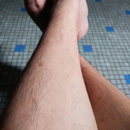 close leg with hairs - hair growth after waxing